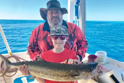 A proud moment for Neil Pyle, with grandson Hudson and his first shark mackerel.