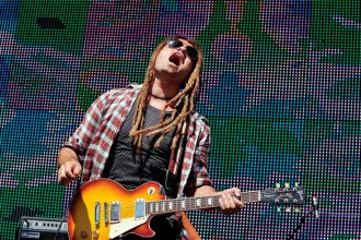 Ash Grunwald performs on stage at the Pyramid Rock Festival on Phillip Island in 2011.