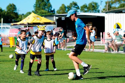 BRIGHT FUTURE: Eager youngsters are keen to learn new football skills.