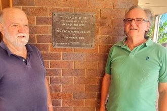 Ian Tully and Neil Gilmour celebrate the Trinity Uniting Church’s 40th anniversary on its Marlborough Rd site. Their families were among those attending in 1983, the year the original church burnt down.