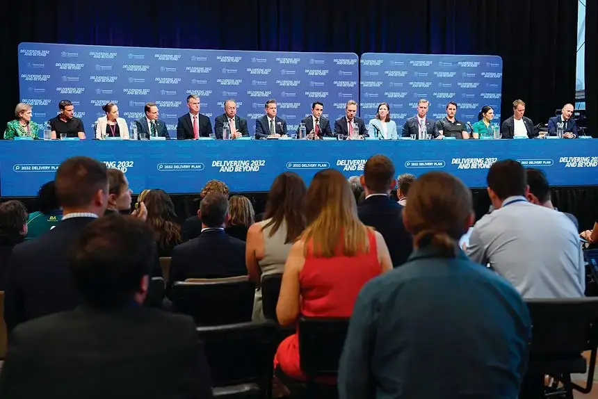 Queensland Premier David Crisafulli (middle) and others speak to a media panel after the announcement of the Games Delivery Plan for the 2032 Olympics and Paralympics.