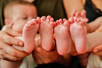 TINY FEET: Twins were born at Dunwich as the cyclone neared.