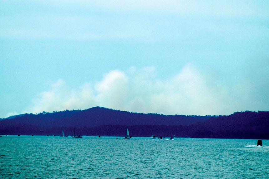 Bushfire smoke hangs over North Stradbroke Island.