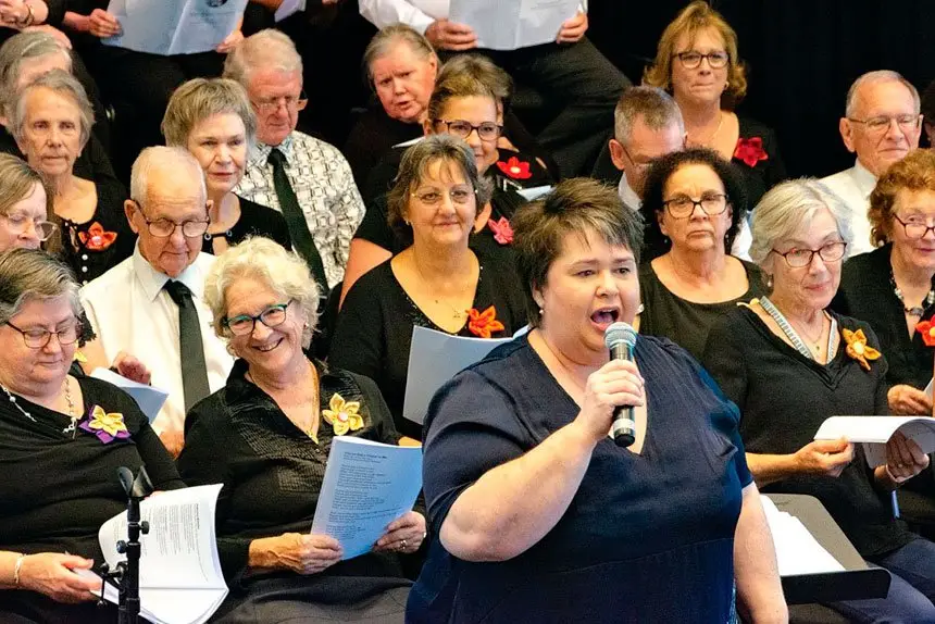 Sing Sing Sing Founder and Artistic Director Melissa Gill leads the choir.