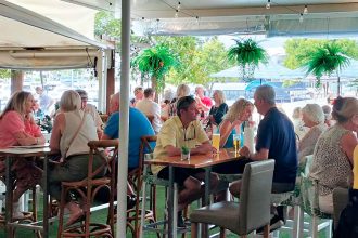 Diners relax at Chop ’n Chill at Raby Bay Marina.