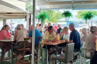 Diners relax at Chop ’n Chill at Raby Bay Marina.