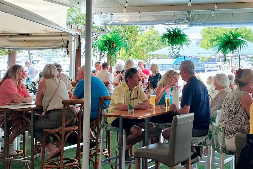 Diners relax at Chop ’n Chill at Raby Bay Marina.