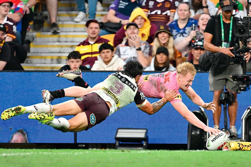 Panthers flyer Thomas Jenkins scores during the NRL Round 9 clash with the Brisbane Broncos. PHOTO: AAP Image/Dave Hunt