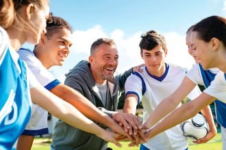 SUPPORT SYSTEMS: Valuing both academic and athletic achievements can foster belonging.
