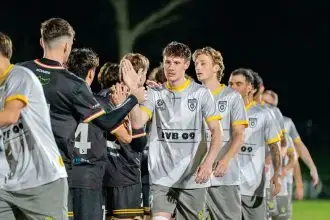 Players acknowledge the hard-fought contest.