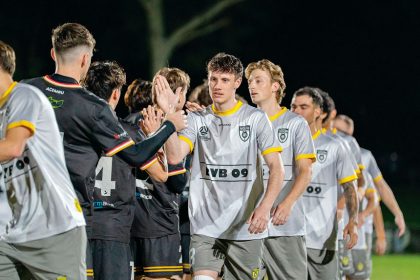 Players acknowledge the hard-fought contest.