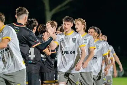 Players acknowledge the hard-fought contest.