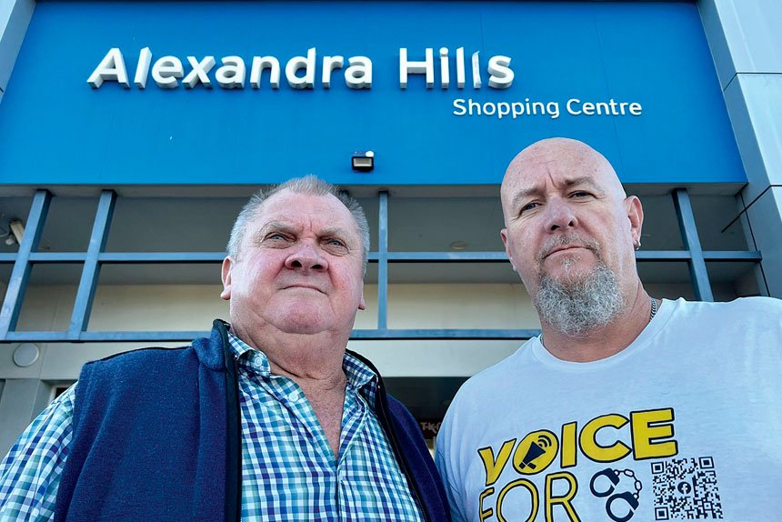 Capalaba MP Russell Field and stab victim Chris Sanders outside the Alex Hills Shopping Centre where the attack took place.