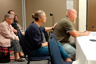 CALL FOR JUSTICE: Chis Sanders relives his nightmare at a recent government hearing at the Alexandra Hills Hotel.