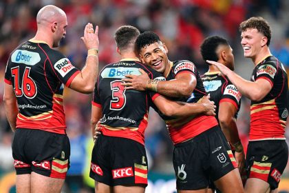 Dolphins flyer Jamayne Isaako (centre) celebrates after scoring during the weekend’s NRL win over the Dragons. PHOTO: AAP IMAGES