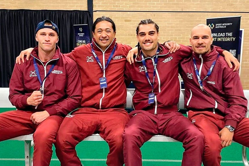 “Coach Neon Leon” with his trio of successful fighters.