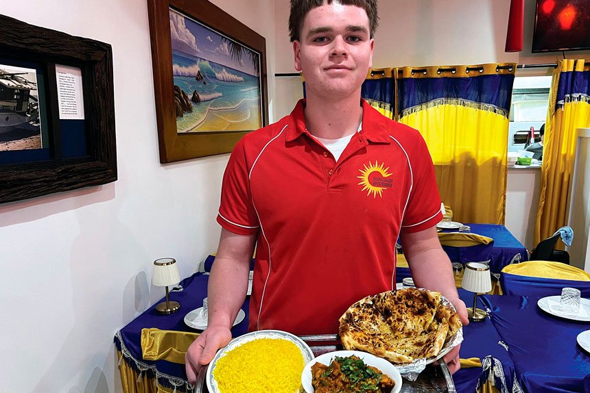 TASTE OF INDIA: Ethan Brady from Punjabi Sunrise with some of the flavoursome food.