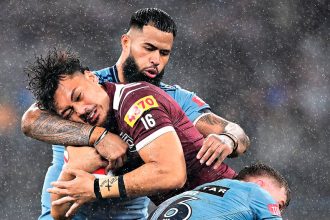 Jeremiah Nanai and Payne Haas collide during State of Origin game two. PHOTO: AAP IMAGE