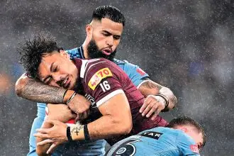 Jeremiah Nanai and Payne Haas collide during State of Origin game two. PHOTO: AAP IMAGE