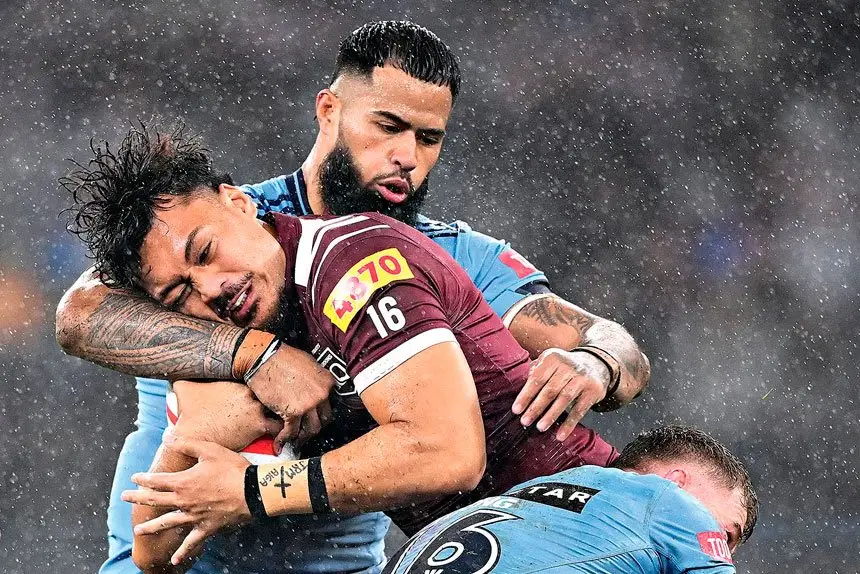 Jeremiah Nanai and Payne Haas collide during State of Origin game two. PHOTO: AAP IMAGE