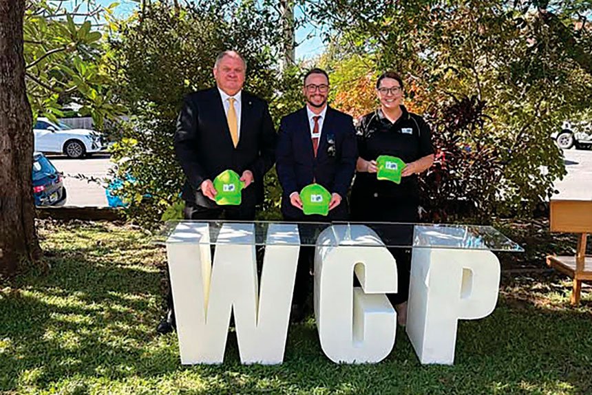 CELEBRATING: From left: State Member for Capalaba Russell Field, United Community Services General Manager Ronan Wicks and Wynnum Community Place Coordinator Lauren Andreatta.
