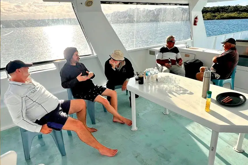 MEN’S CLUB: And no fish on the table ... members of the Rotary Club of Cleveland on their annual fishing trip, which is described as “schoolies for grown-up men”.