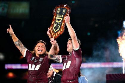 Josh Papalii and Cameron Munster following the Maroons’ series win in the State of Origin. PHOTO: AAP Image/Dan Himbrechts