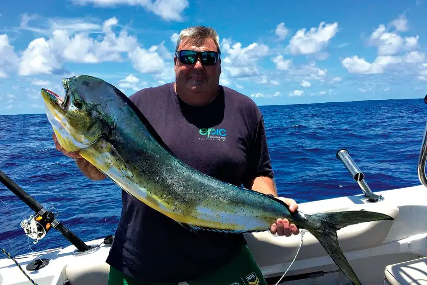 CATCH OF THE DAY: Ron Wilkinson with his 12kg mahi-mahi in Moreton Bay..