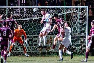 Redlands’ man of the match Deegan Brook heads home his team’s solitary goal. Photo: Ray Gardner