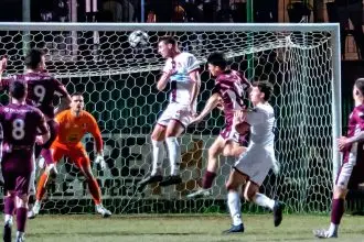 Redlands’ man of the match Deegan Brook heads home his team’s solitary goal. Photo: Ray Gardner