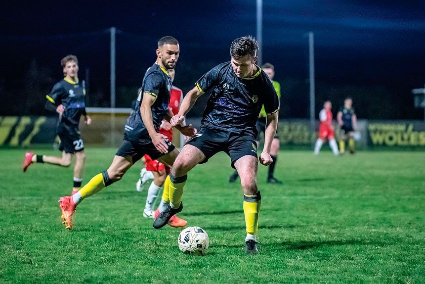 Zach Maltby controls the ball, ready for another Wolves attack on the Olympic FC goal.