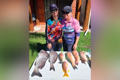 Friends Julie Bates and Lyndy Pennisi with a few nights’ dinner caught off Great Keppell Island.