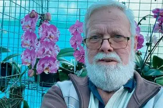 WELCOME ESCAPE: Growing orchids has been a great stress relief for Greg Webb.