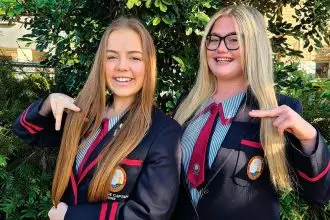 Rylee Crossley (College Captain) and Emee Standing (event organiser) had their hair chopped for charity.