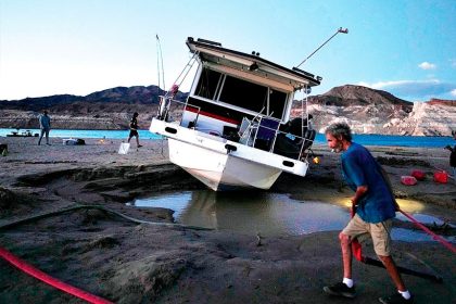 TIME TO GO: The abandoned houseboat is removed. (Not houseboat in story)