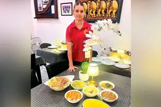 Waitress Tania Overson from the Punjabi Sunrise in Alexandra Hills.