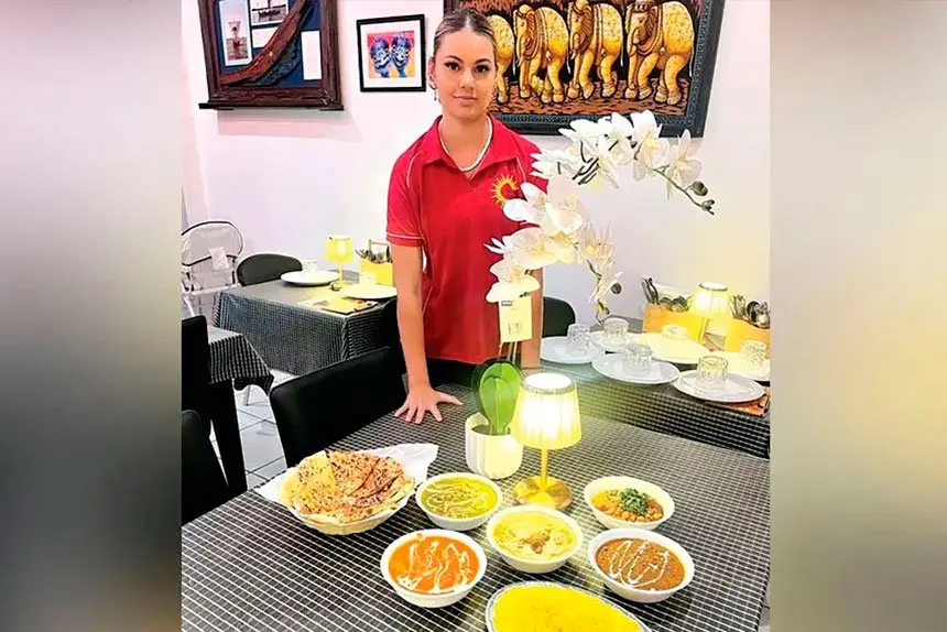 Waitress Tania Overson from the Punjabi Sunrise in Alexandra Hills.