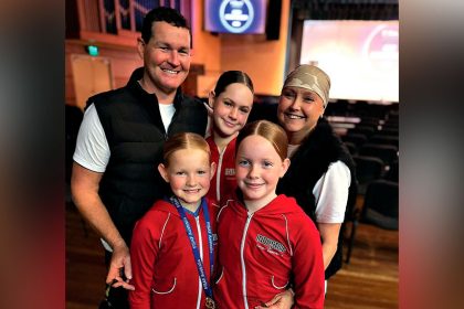 TRUE FIGHTER: Jodie Bromiley with her proud family.