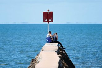 BAYSIDE BLISS: Relaxing along the Wynnum foreshore.
