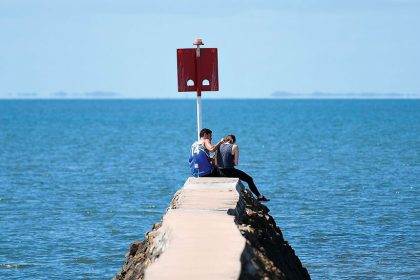 BAYSIDE BLISS: Relaxing along the Wynnum foreshore.