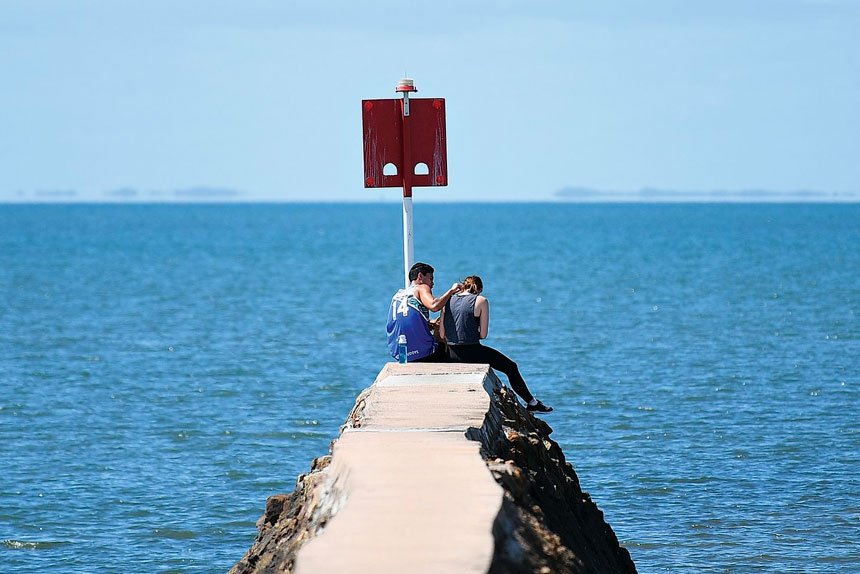 BAYSIDE BLISS: Relaxing along the Wynnum foreshore.