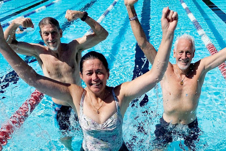 TAKING THE PLUNGE: Brett Smith, Michelle Maher and Gordon Lawrence in training at Cleveland for the swim-a-thon this Saturday.