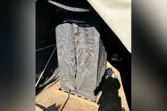 Officers allegedly uncovered a hydro tent for cannabis production.