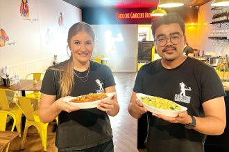 READY TO DELIGHT: Gnocchi Gnocchi Brothers Cleveland General Manager Shravik Shrestha and Charlotte Crawford.