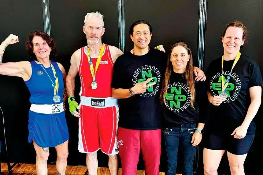 MASTERFUL DISPLAY: Neon Boxing Academy’s successful Masters boxers with coach Neon Leon.