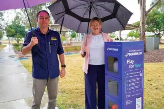 Cr Jason Colley and Redland City Mayor Jos Mitchell with the SportsBox locker at Raby Esplanade Park.