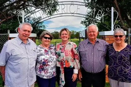 NEW LOOK: Noel and Lorraine Newton, Mayor Jos Mitchell, and John and Caroline Price at the restored Norm Price Park gates.