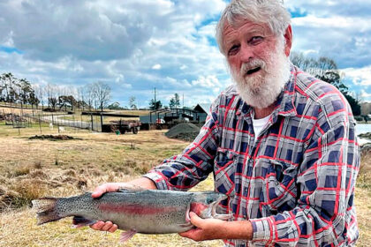 DAM GOOD: John Lee with a 4.8kg rainbow trout caught at a dam near Glen Innes.