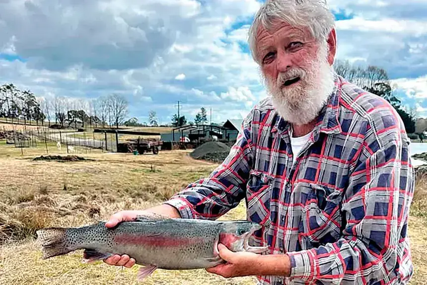 DAM GOOD: John Lee with a 4.8kg rainbow trout caught at a dam near Glen Innes.