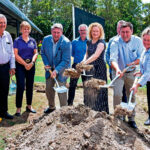 MANY HANDS: Sharing the spadework, from left, Sean Kelly, Amanda Stoker, Henry Pike and Jos Mitchell.